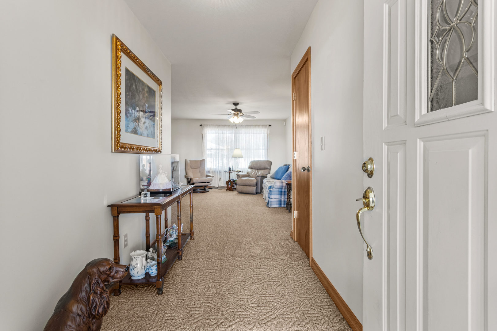 708 East Benham Street Tolono, IL 61880 - Photo 4 of 34 a view of a livingroom with furniture and a window