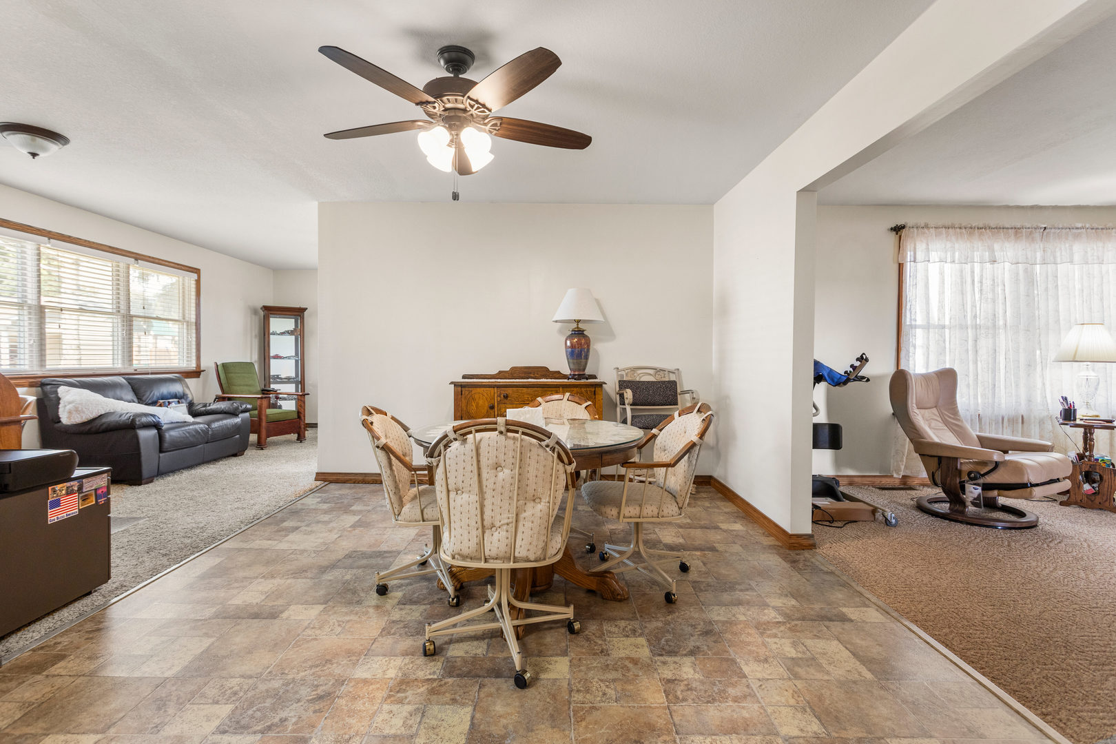 708 East Benham Street Tolono, IL 61880 - Photo 10 of 34 a view of a livingroom with workspace and a window