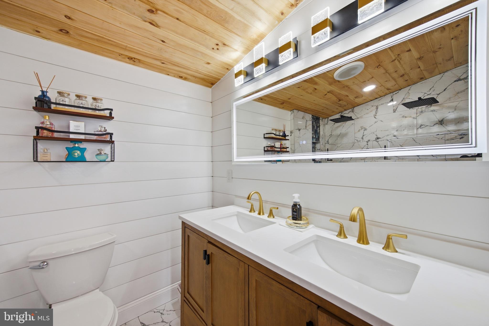 3524 Blenheim Road Phoenix, MD 21131 - Photo 41 of 61 a bathroom with a sink and a mirror