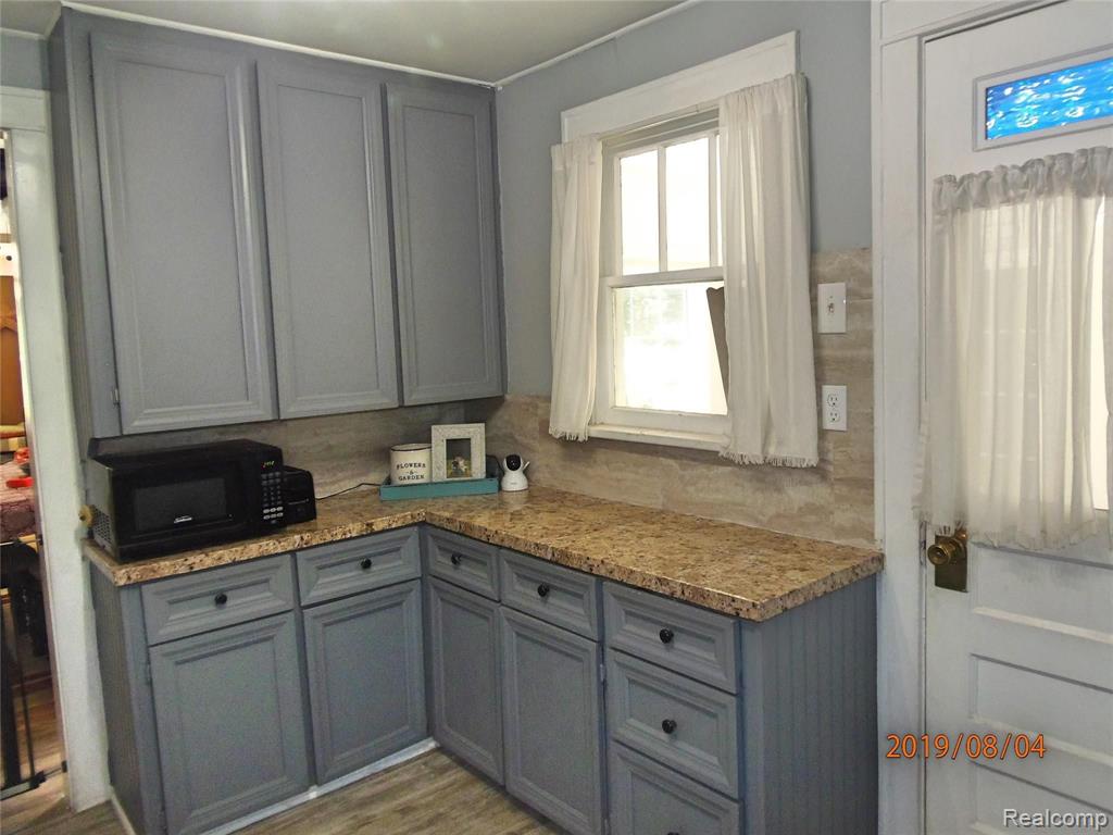 12542 Earl Road Stockbridge, MI 49285 - Photo 4 of 22