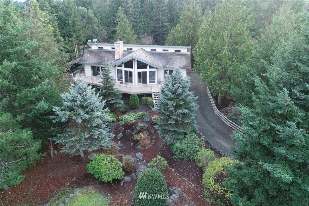 226 Guy Kelly Road Port Angeles, WA 98362 - Photo 2 of 40 an aerial view of a house with a yard