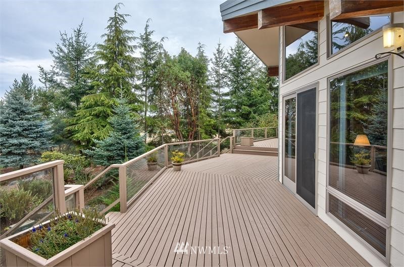 226 Guy Kelly Road Port Angeles, WA 98362 - Photo 22 of 40 a view of balcony with wooden floor and fence