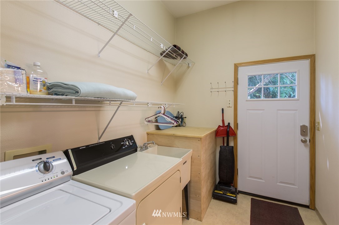 226 Guy Kelly Road Port Angeles, WA 98362 - Photo 26 of 40 a utility room with dryer and washer