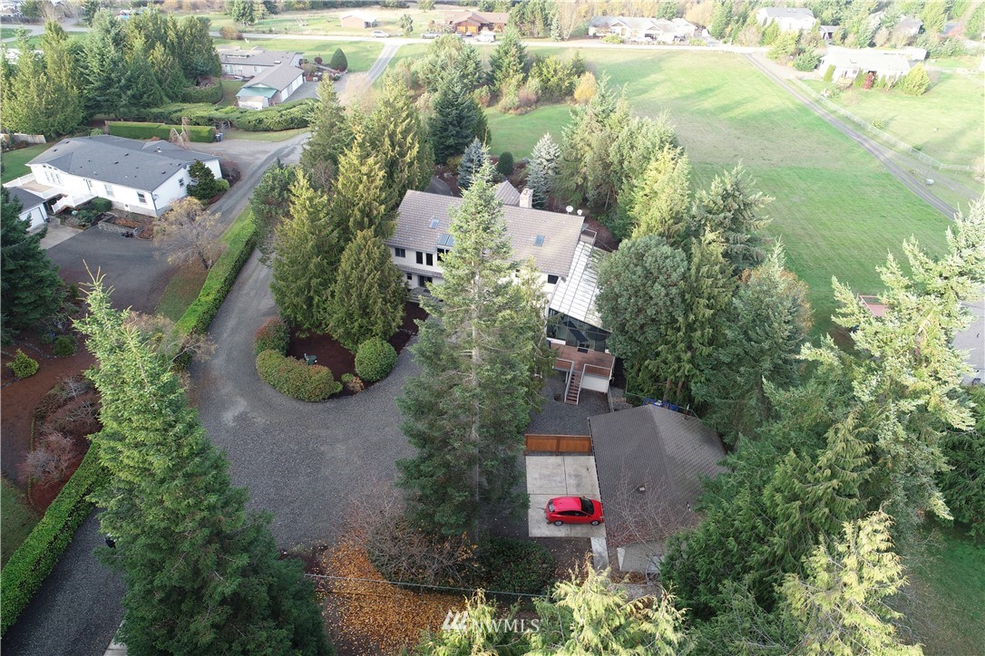 226 Guy Kelly Road Port Angeles, WA 98362 - Photo 36 of 40 an aerial view of residential houses with outdoor space and street view