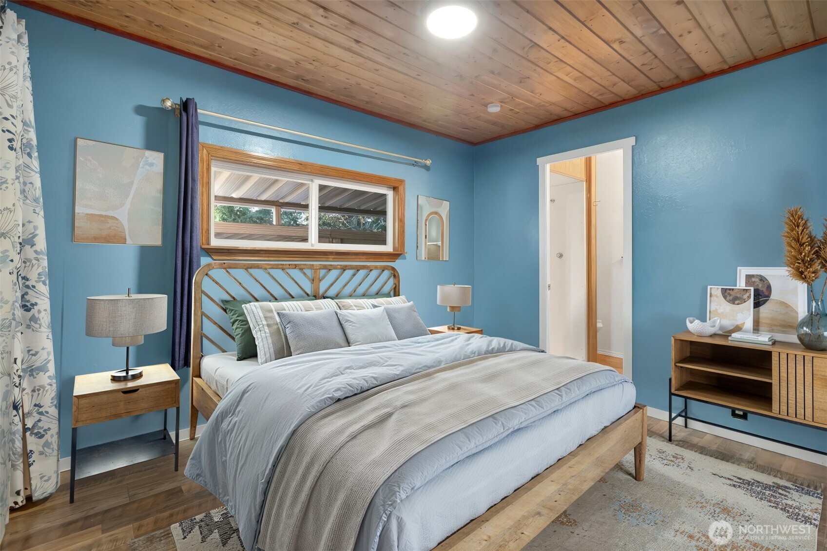 7311 Chambers Creek Road West, Unit 37 University Place, WA 98467 - Photo 18 of 23 a bedroom with a bed and a window