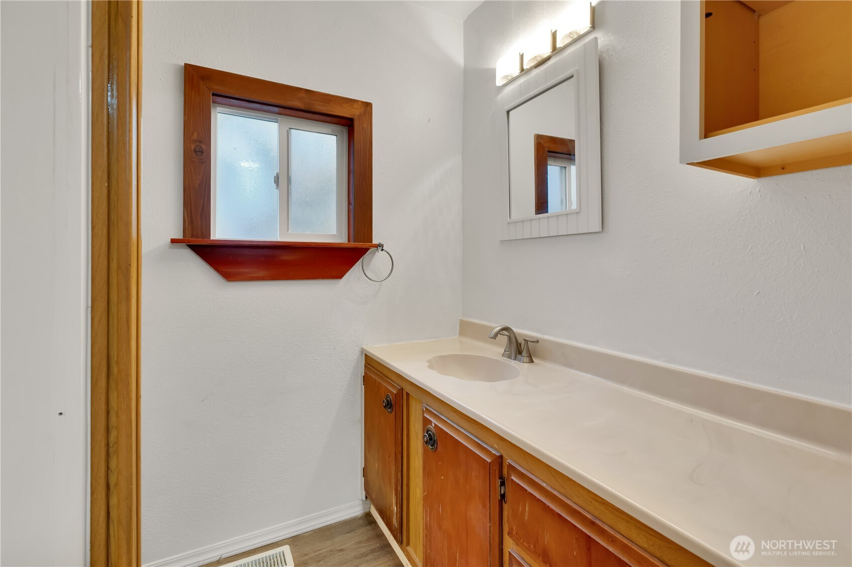 7311 Chambers Creek Road West, Unit 37 University Place, WA 98467 - Photo 20 of 23 a bathroom with a sink and a mirror