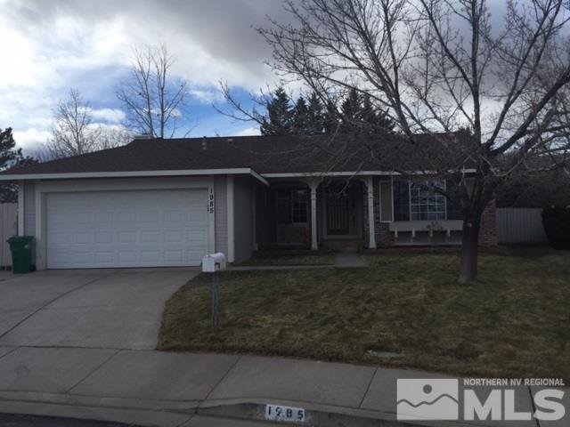 1985 Sweetgrass Lane Reno, NV 89523 - Photo 1 of 1 a front view of a house with garden