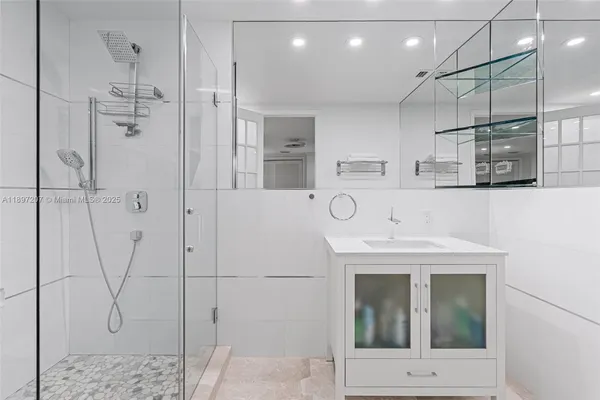 a utility room with dryer and bicycles