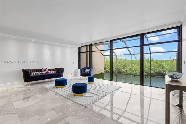 a living room with furniture and a table