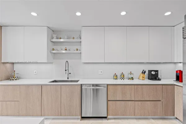 a kitchen with stainless steel appliances cabinets and a kitchen
