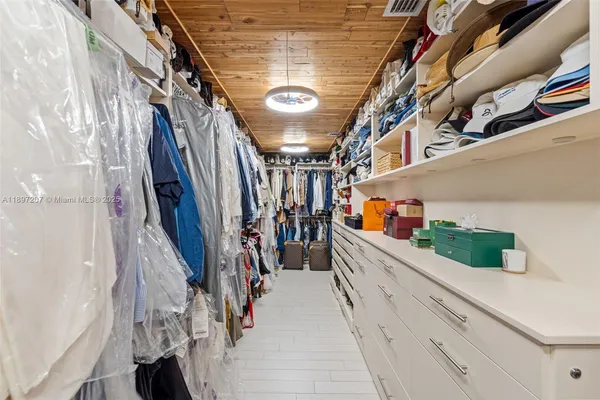 a view of a backyard and swimming pool