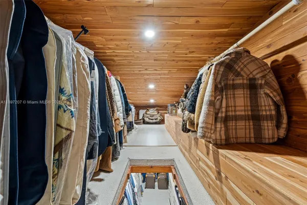 a view of a swimming pool with lounge chair