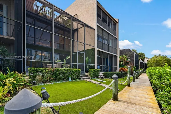 a view of a lake with a garden