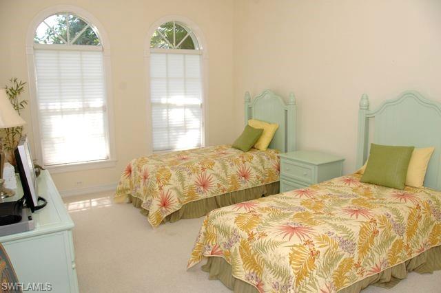 590 East Lake Drive Naples, FL 34102 - Photo 8 of 11 View of carpeted bedroom