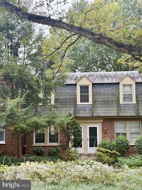 1303 South Barton Street, Unit 204 Arlington, VA 22204 - Photo 1 of 18 a view of a house with a yard