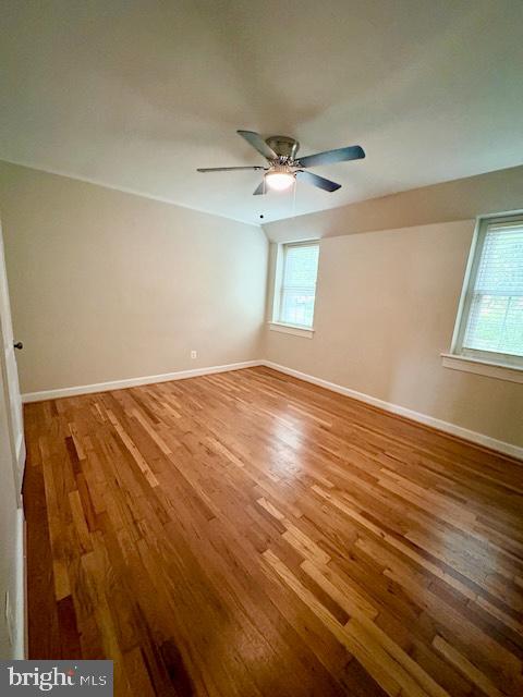 1303 South Barton Street, Unit 204 Arlington, VA 22204 - Photo 13 of 18 wooden floor in an empty room with a window