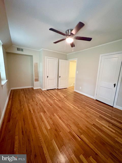 1303 South Barton Street, Unit 204 Arlington, VA 22204 - Photo 14 of 18 a view of empty room with wooden floor