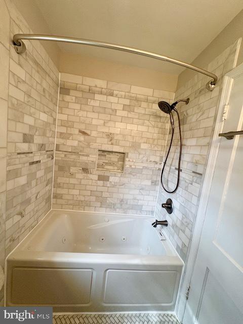 1303 South Barton Street, Unit 204 Arlington, VA 22204 - Photo 16 of 18 a bathroom with a shower and a bathtub