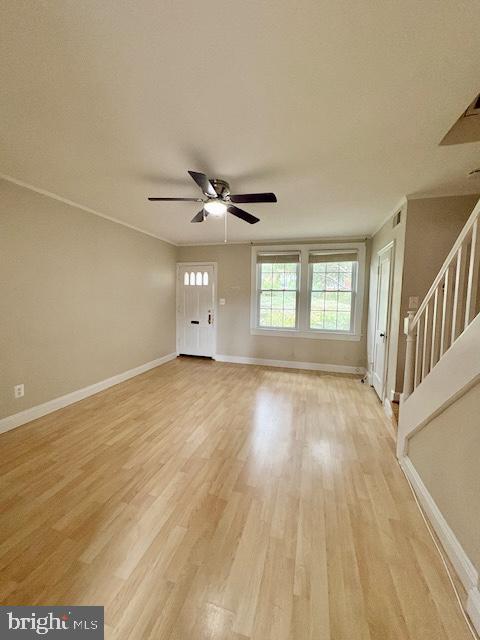 1303 South Barton Street, Unit 204 Arlington, VA 22204 - Photo 5 of 18 a view of an empty room with wooden floor and a window