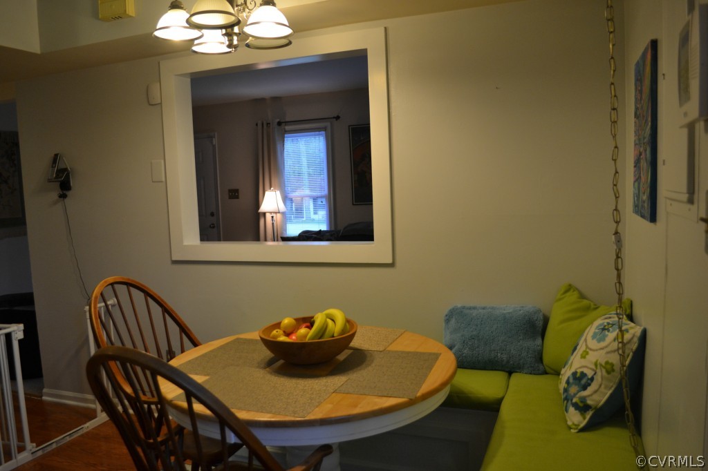 5413 Rollingway Road Chesterfield, VA 23832 - Photo 4 of 19 a view of a dining room with furniture and wooden floor