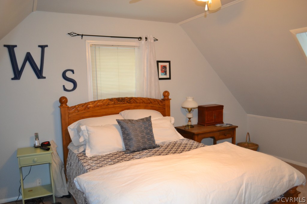 5413 Rollingway Road Chesterfield, VA 23832 - Photo 5 of 19 a bedroom with a bed and a table