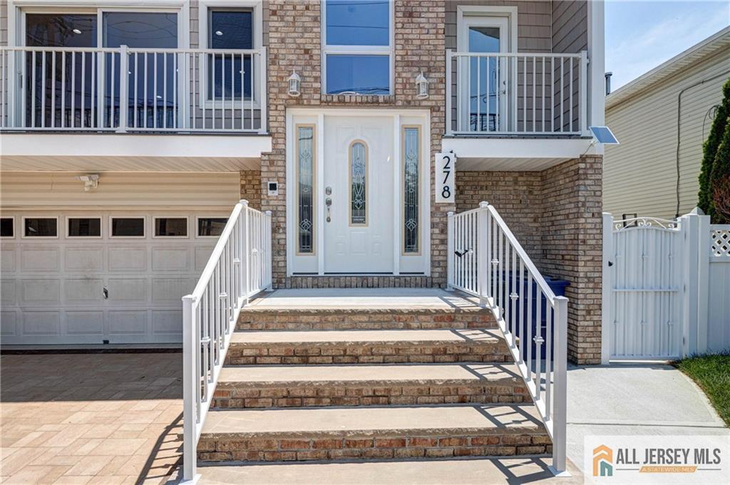 278 Rector Street Perth Amboy, NJ 08861 - Photo 5 of 47 a view of a house with wooden floor and a fireplace