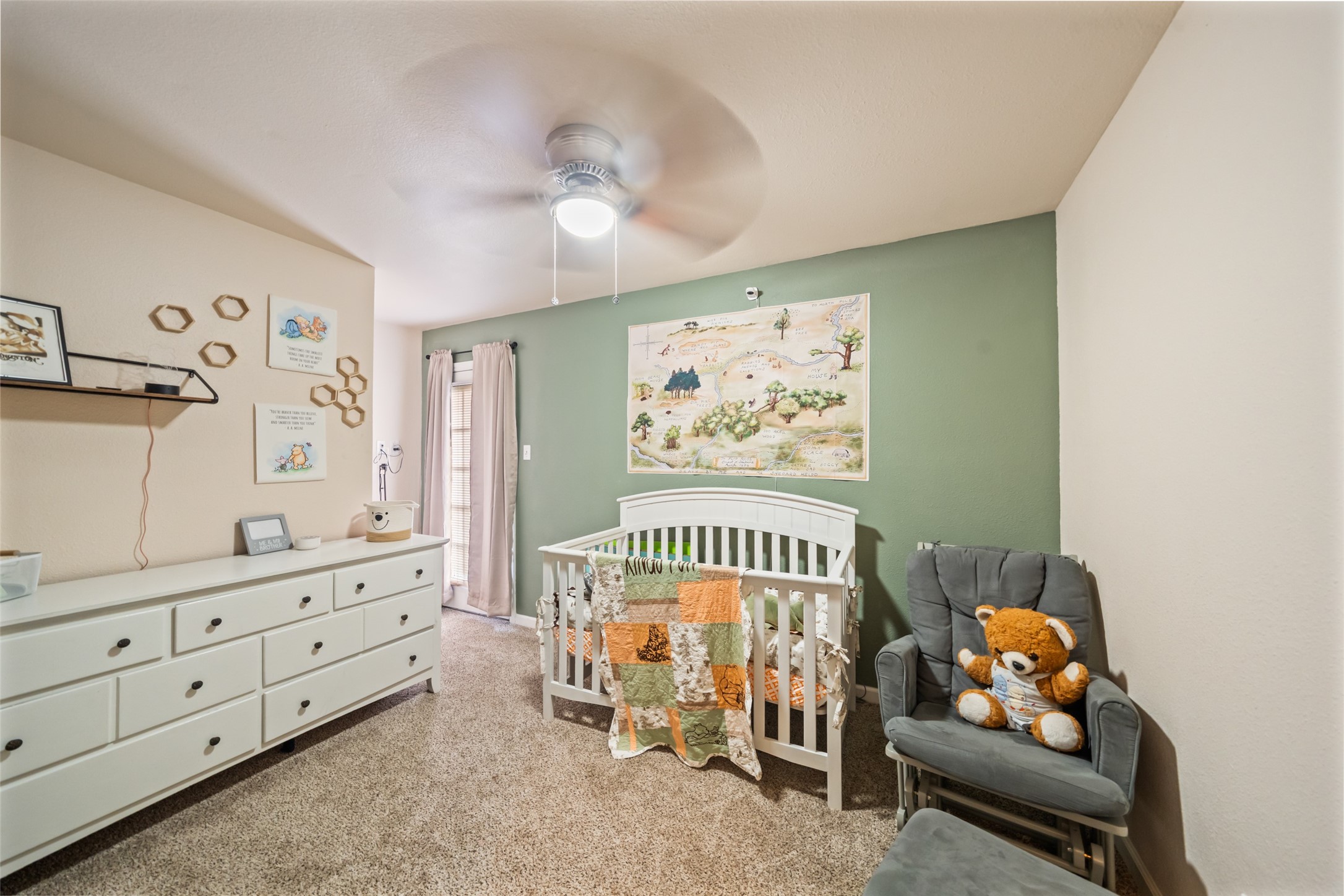 600 Hampton Hall Lane Conroe, TX 77302 - Photo 26 of 32 a bedroom with furniture and a window