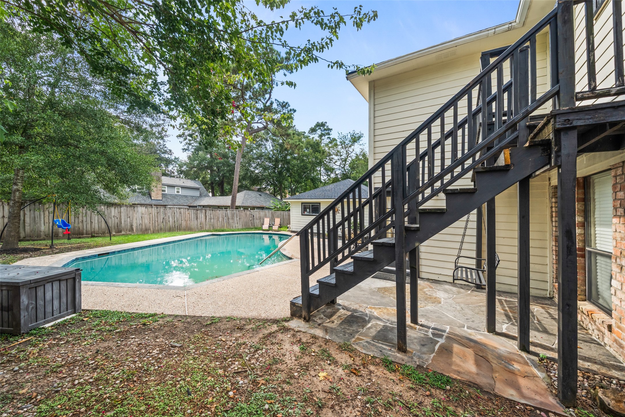 600 Hampton Hall Lane Conroe, TX 77302 - Photo 29 of 32 a view of a garden with deck