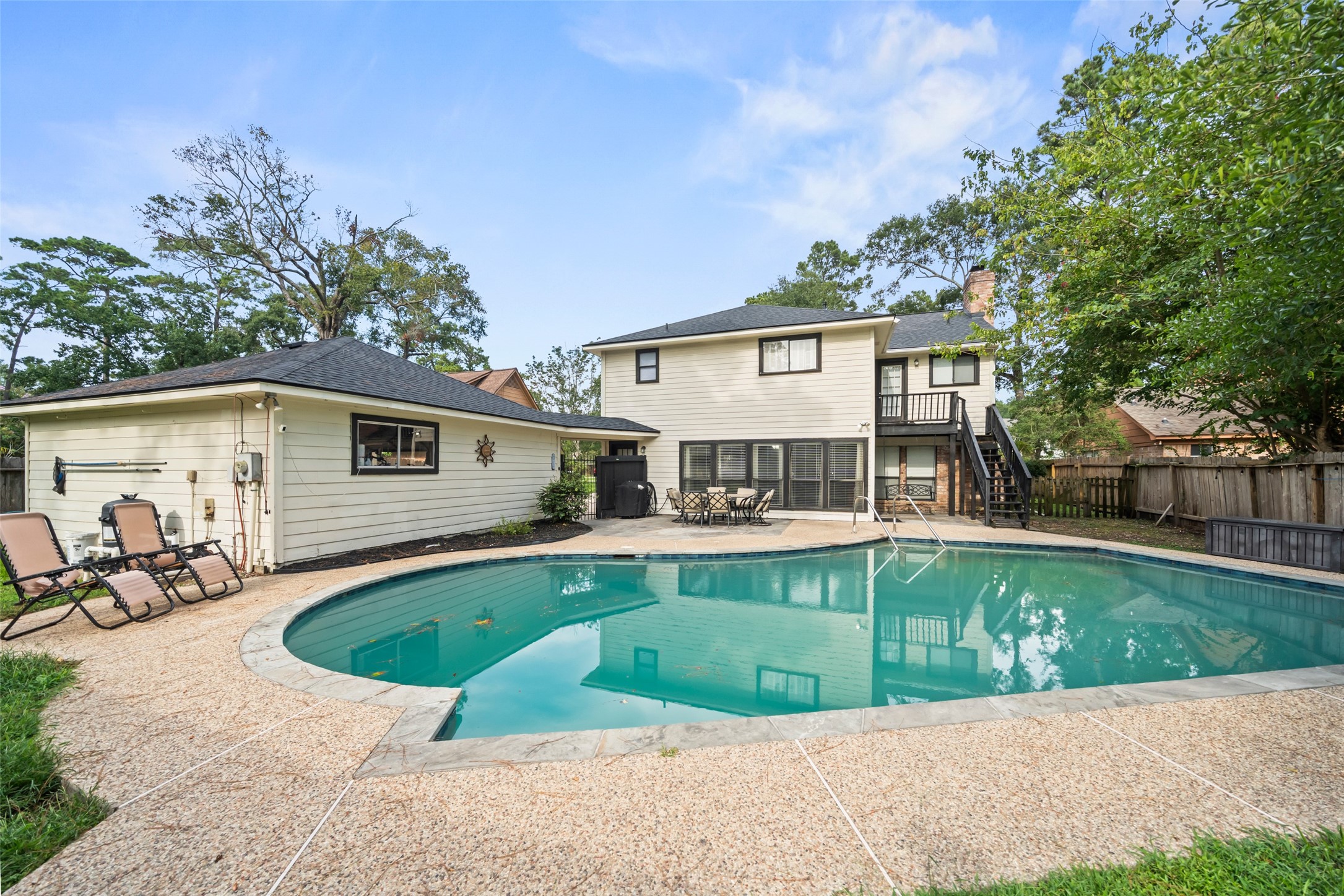 600 Hampton Hall Lane Conroe, TX 77302 - Photo 3 of 32 a view of a house with a swimming pool