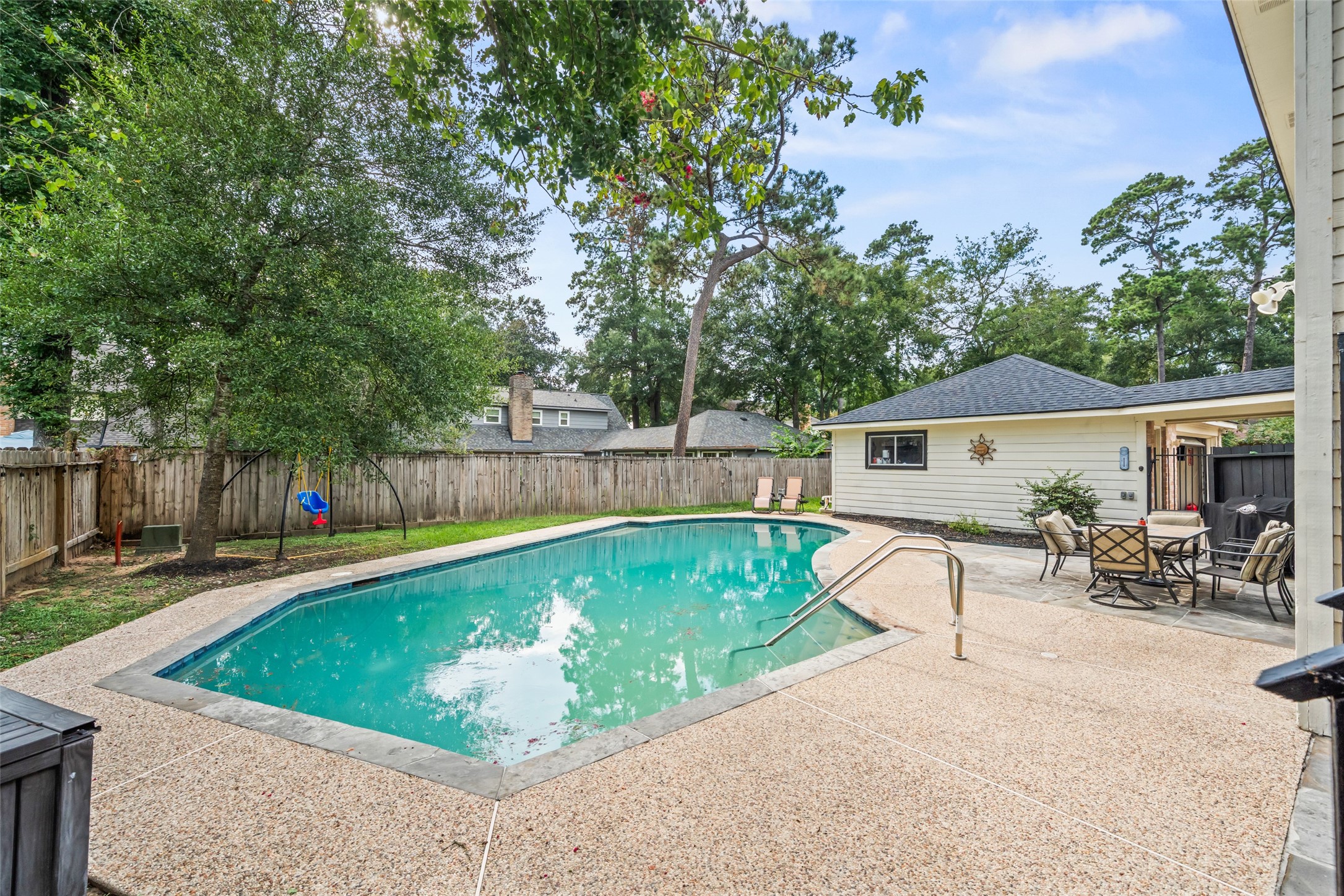 600 Hampton Hall Lane Conroe, TX 77302 - Photo 31 of 32 a view of a house with backyard and sitting area