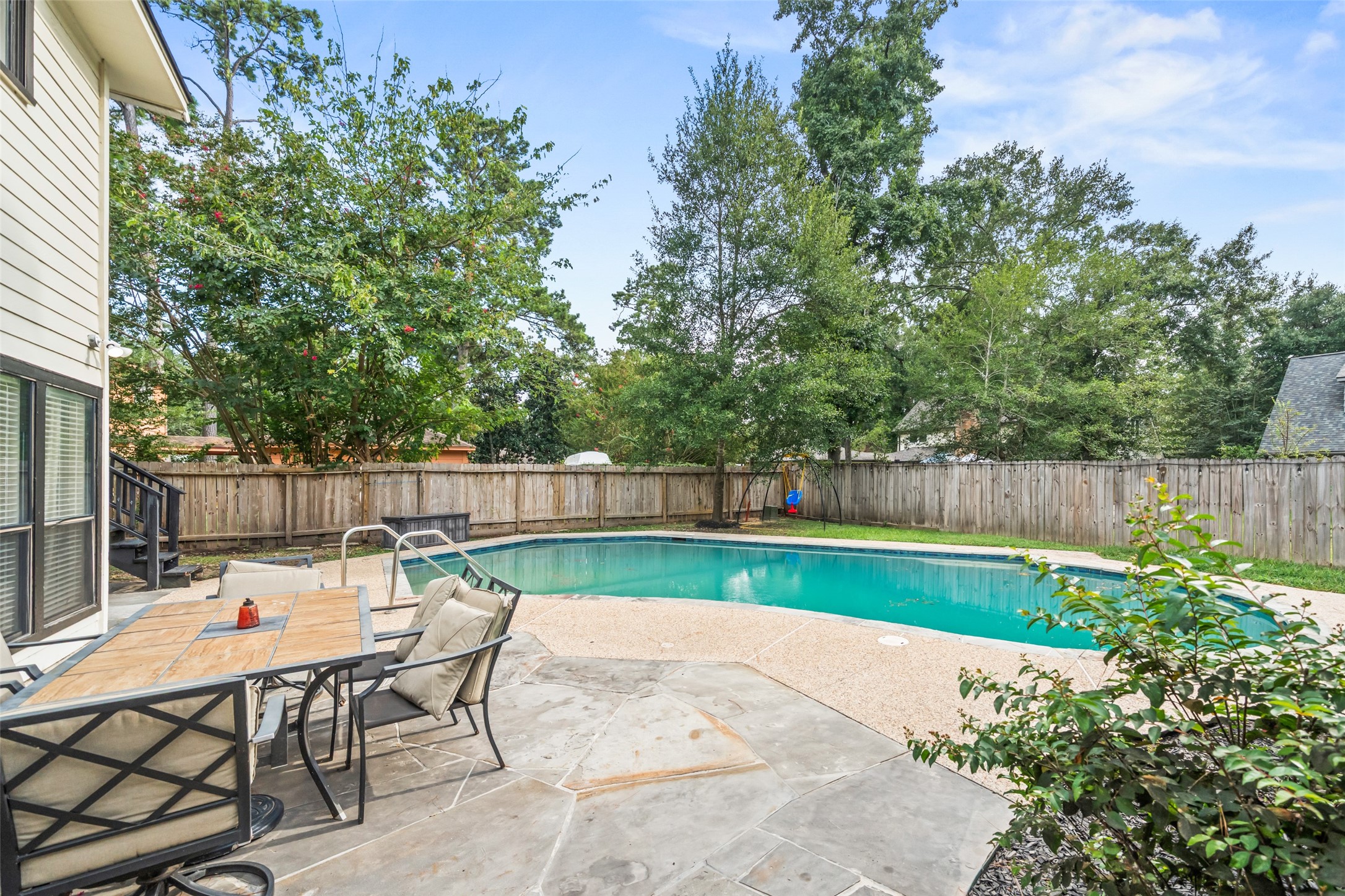 600 Hampton Hall Lane Conroe, TX 77302 - Photo 32 of 32 a view of a backyard with sitting area
