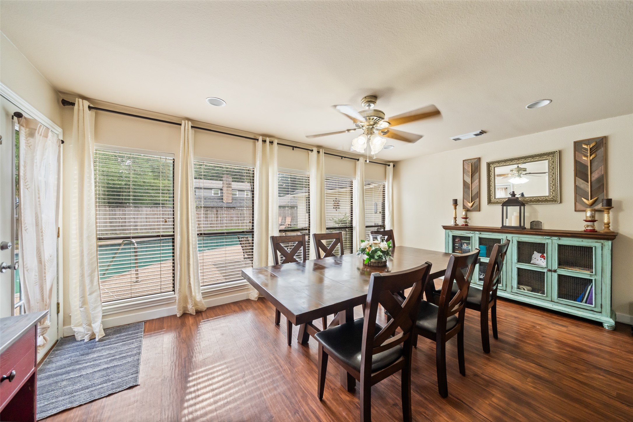 600 Hampton Hall Lane Conroe, TX 77302 - Photo 5 of 32 a view of a dining room with furniture window and wooden floor