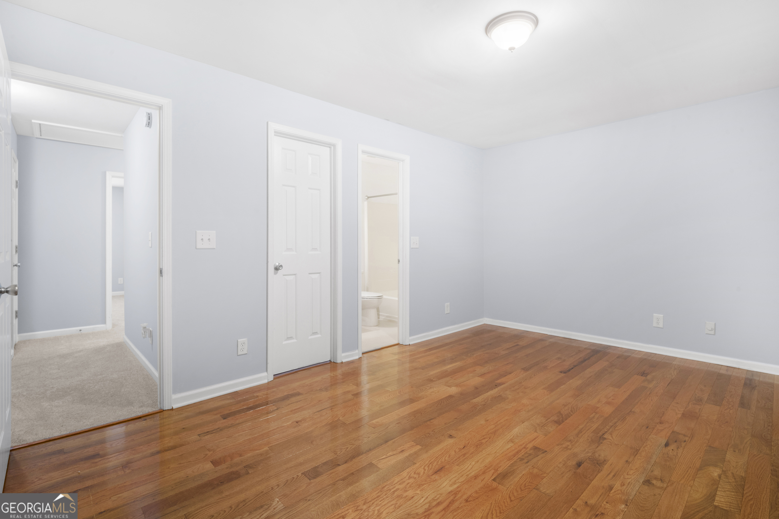 661 North Parkwood Road Decatur, GA 30030 - Photo 9 of 13 Primary bedroom with two Walk in Closets
