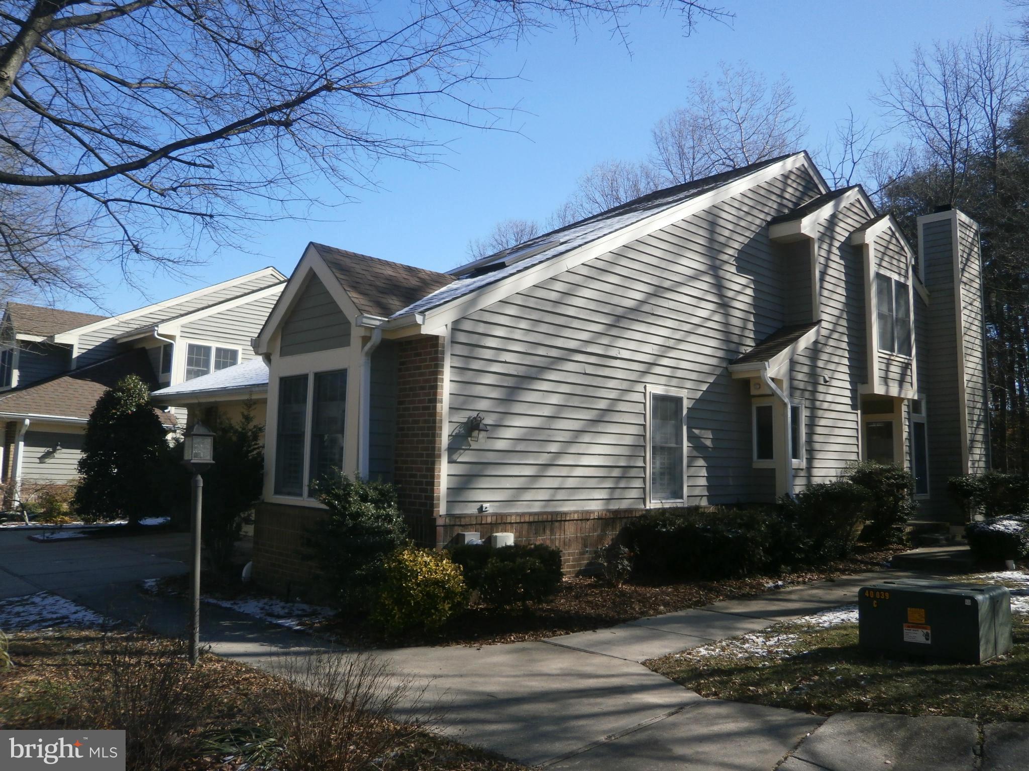 100 Spring Pl Way Annapolis, MD 21401 - Photo 1 of 15 a front view of a house with garden
