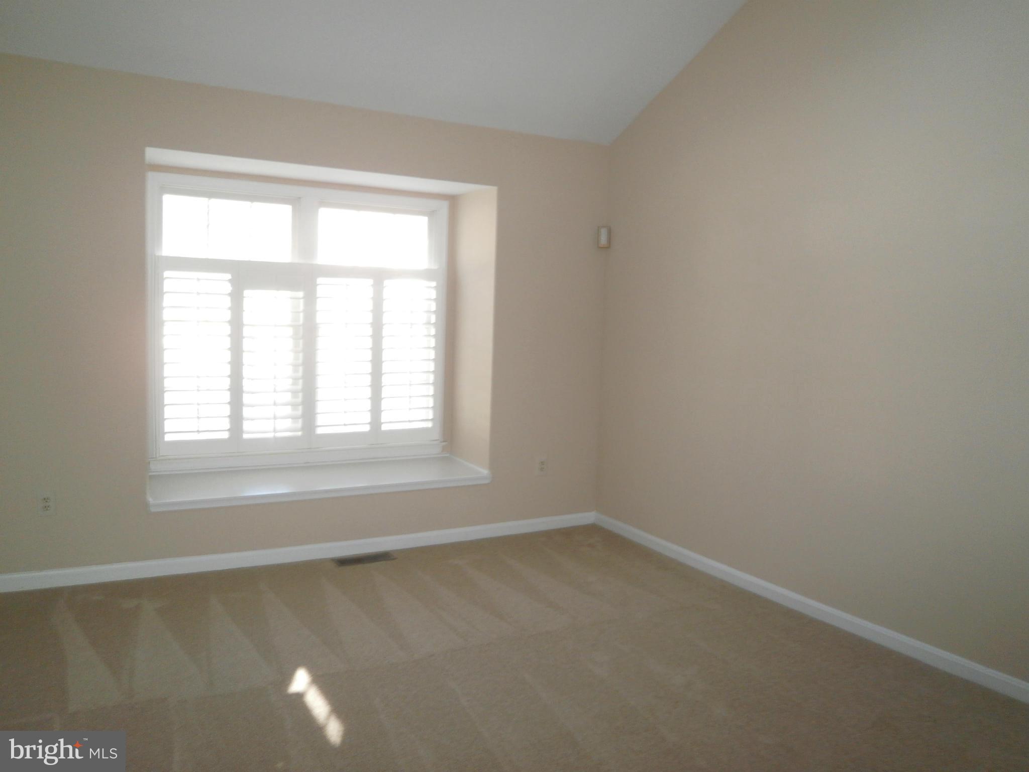 100 Spring Pl Way Annapolis, MD 21401 - Photo 11 of 15 an empty room with a window