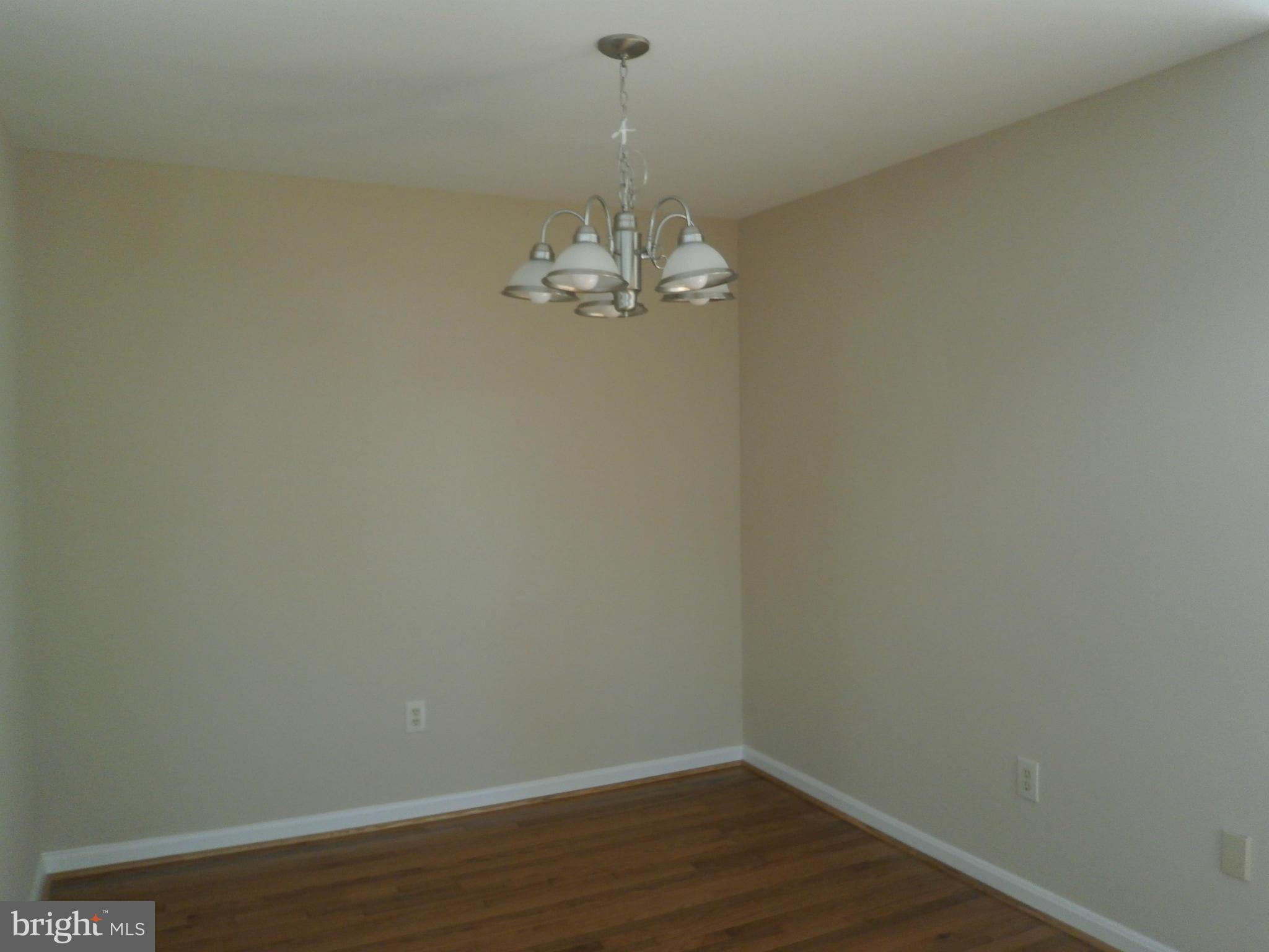 100 Spring Pl Way Annapolis, MD 21401 - Photo 7 of 15 a view of a chandelier in big room