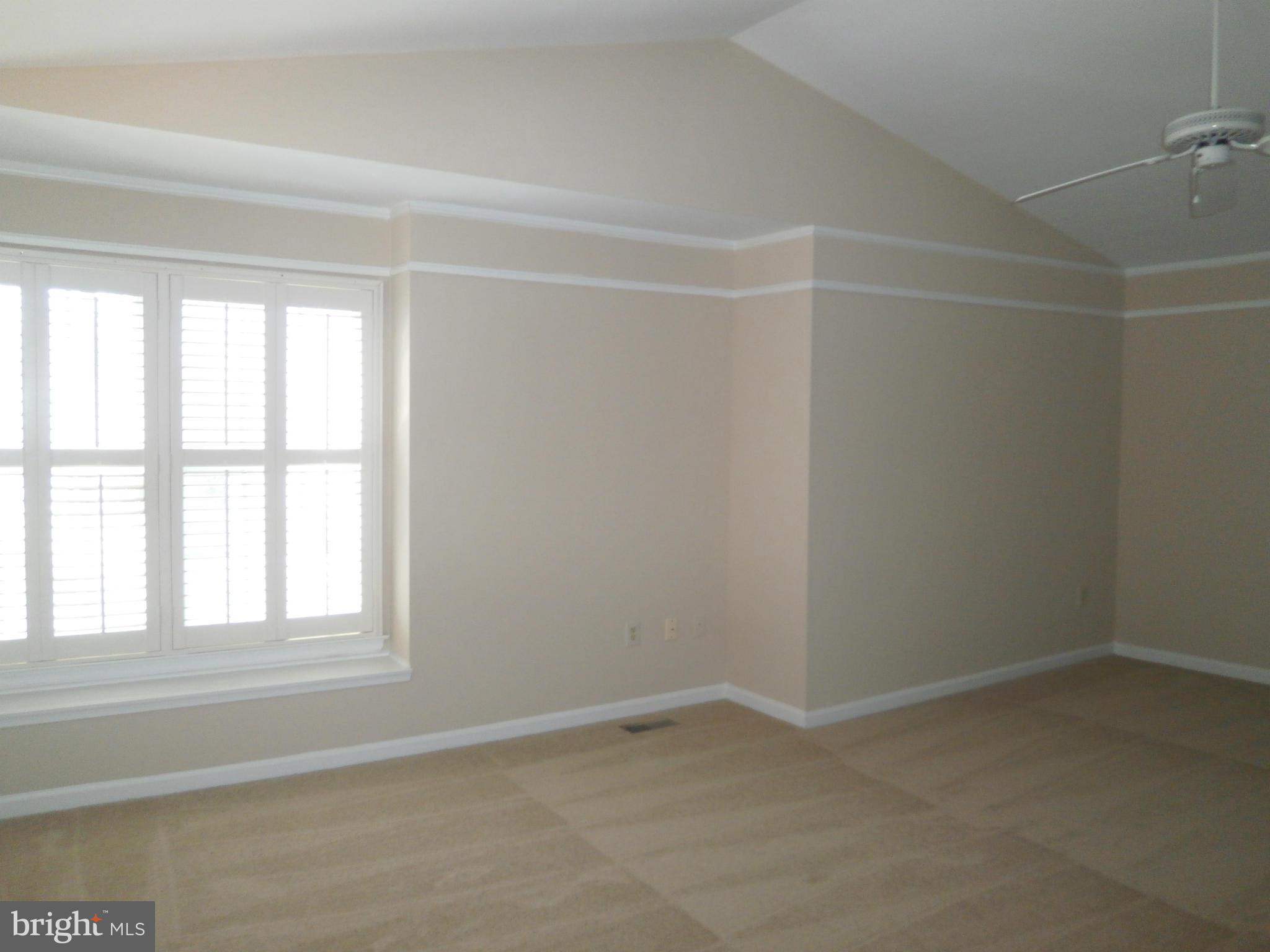 100 Spring Pl Way Annapolis, MD 21401 - Photo 10 of 15 an empty room with a empty space and a window