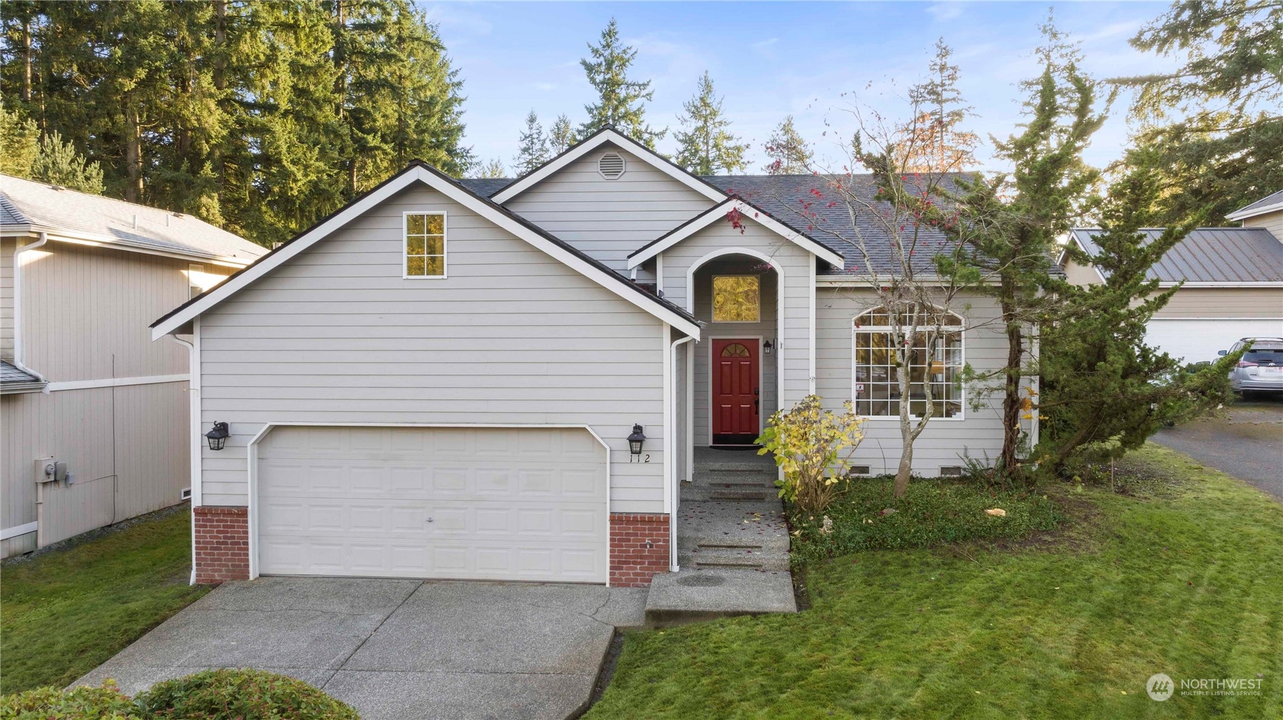 112 172nd Place Southeast Bothell, WA 98012 - Photo 1 of 30 a front view of a house with garden