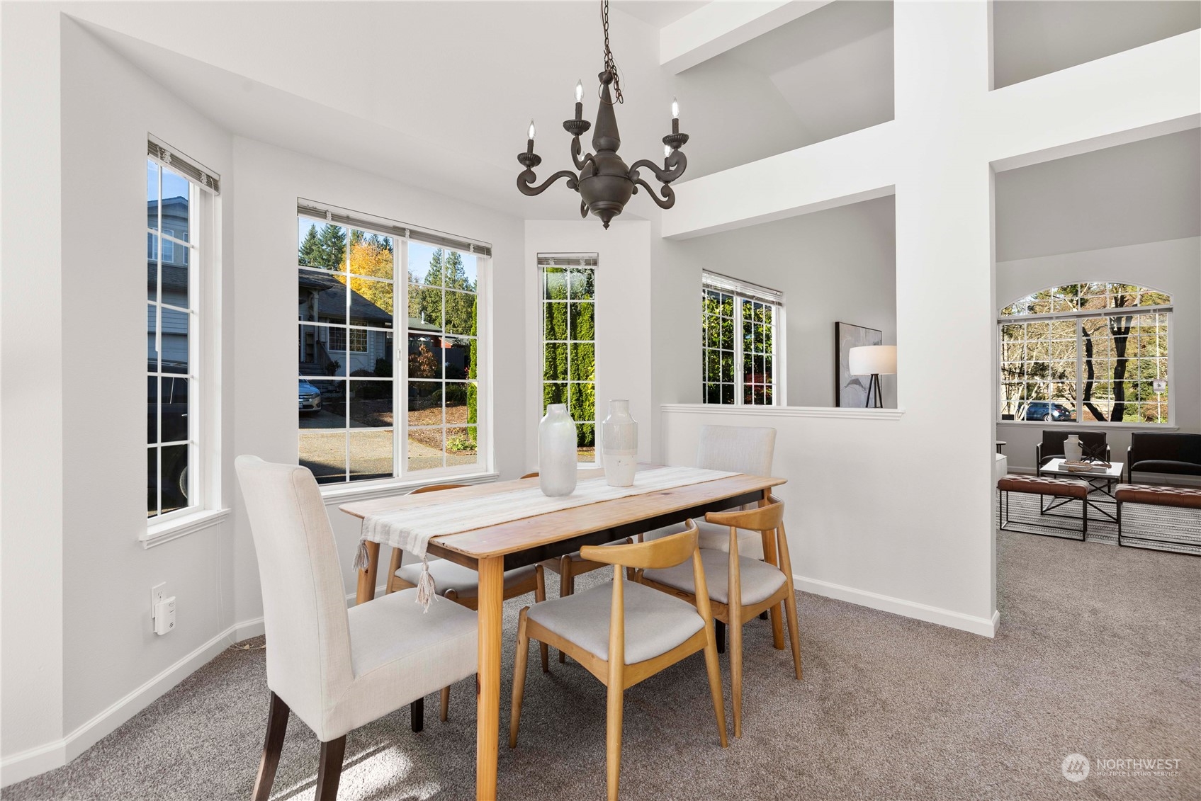 112 172nd Place Southeast Bothell, WA 98012 - Photo 11 of 30 a view of a dining room with furniture window and wooden floor