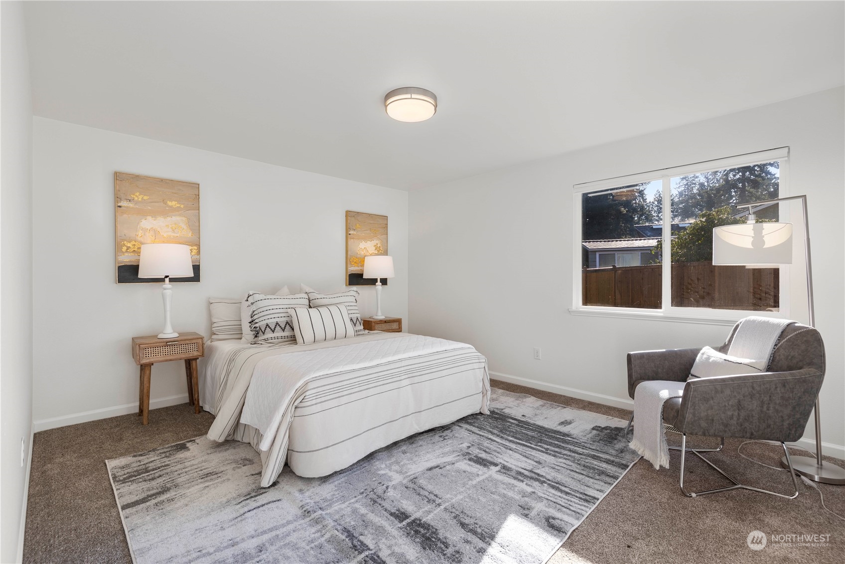 112 172nd Place Southeast Bothell, WA 98012 - Photo 16 of 30 a bedroom with a bed and a couch