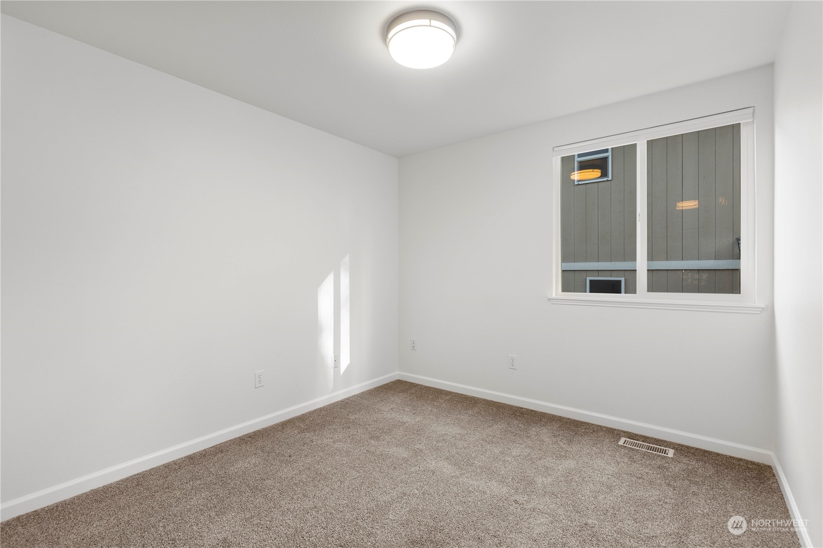 112 172nd Place Southeast Bothell, WA 98012 - Photo 21 of 30 an empty room with a window