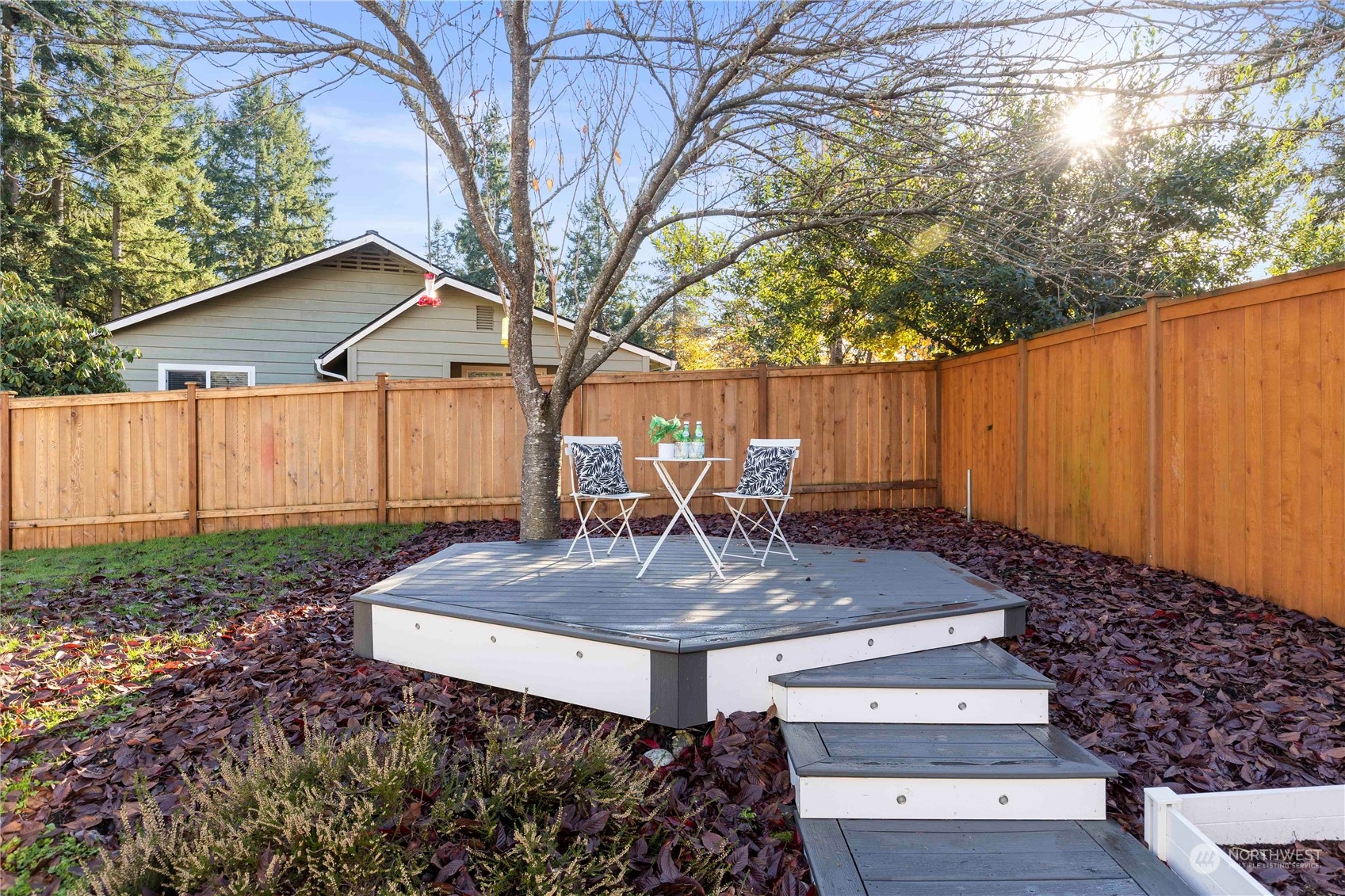 112 172nd Place Southeast Bothell, WA 98012 - Photo 26 of 30 a view of a yard with wooden fence