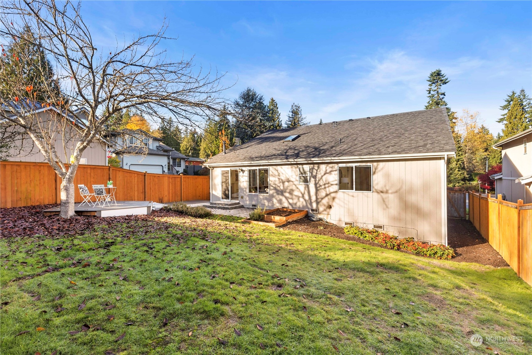 112 172nd Place Southeast Bothell, WA 98012 - Photo 27 of 30 a front view of house with yard and trees in the background