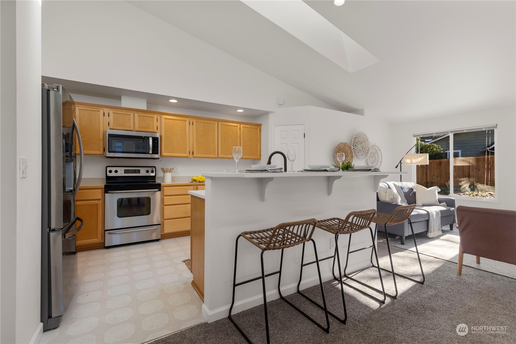 112 172nd Place Southeast Bothell, WA 98012 - Photo 7 of 30 a kitchen with a table and chairs in it