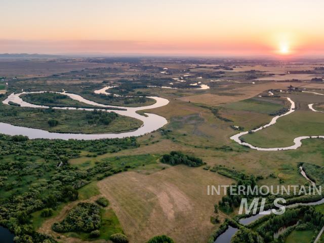 6891 West 2000 South Rexburg, ID 83440 - Photo 15 of 50 Aerial view at dusk of a water view