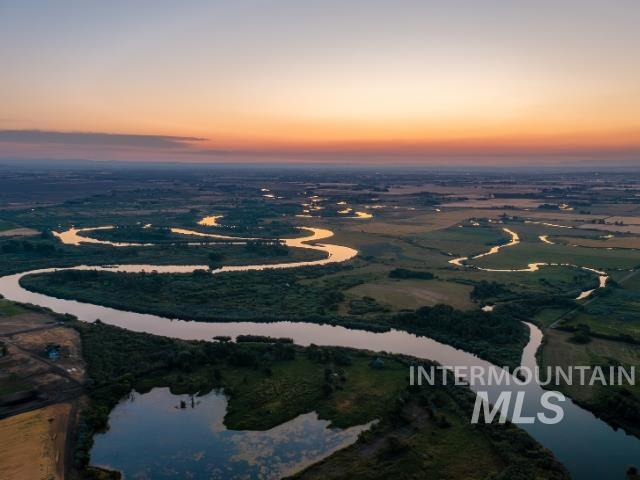 6891 West 2000 South Rexburg, ID 83440 - Photo 2 of 50 Aerial view at dusk of a water view