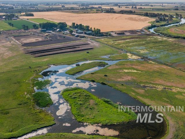 6891 West 2000 South Rexburg, ID 83440 - Photo 31 of 50 Aerial overview of property's location with rural landscape