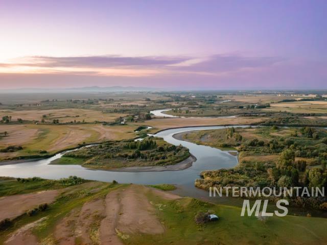 6891 West 2000 South Rexburg, ID 83440 - Photo 48 of 50 Aerial view at dusk of a water view