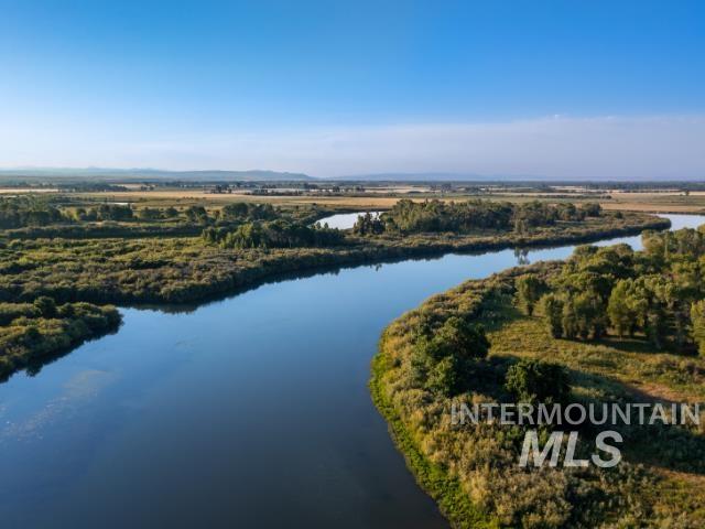 6891 West 2000 South Rexburg, ID 83440 - Photo 5 of 50 Drone / aerial view of a nearby body of water