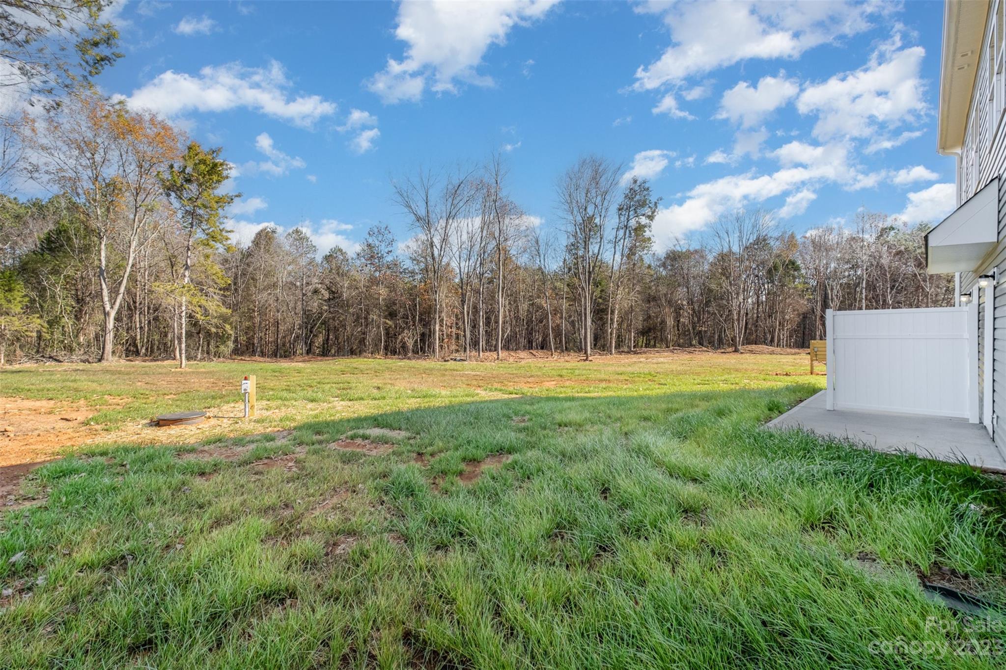 2870-2874 Fay Jones Road Denver, NC 28037 - Photo 21 of 23 a view of outdoor space with green field